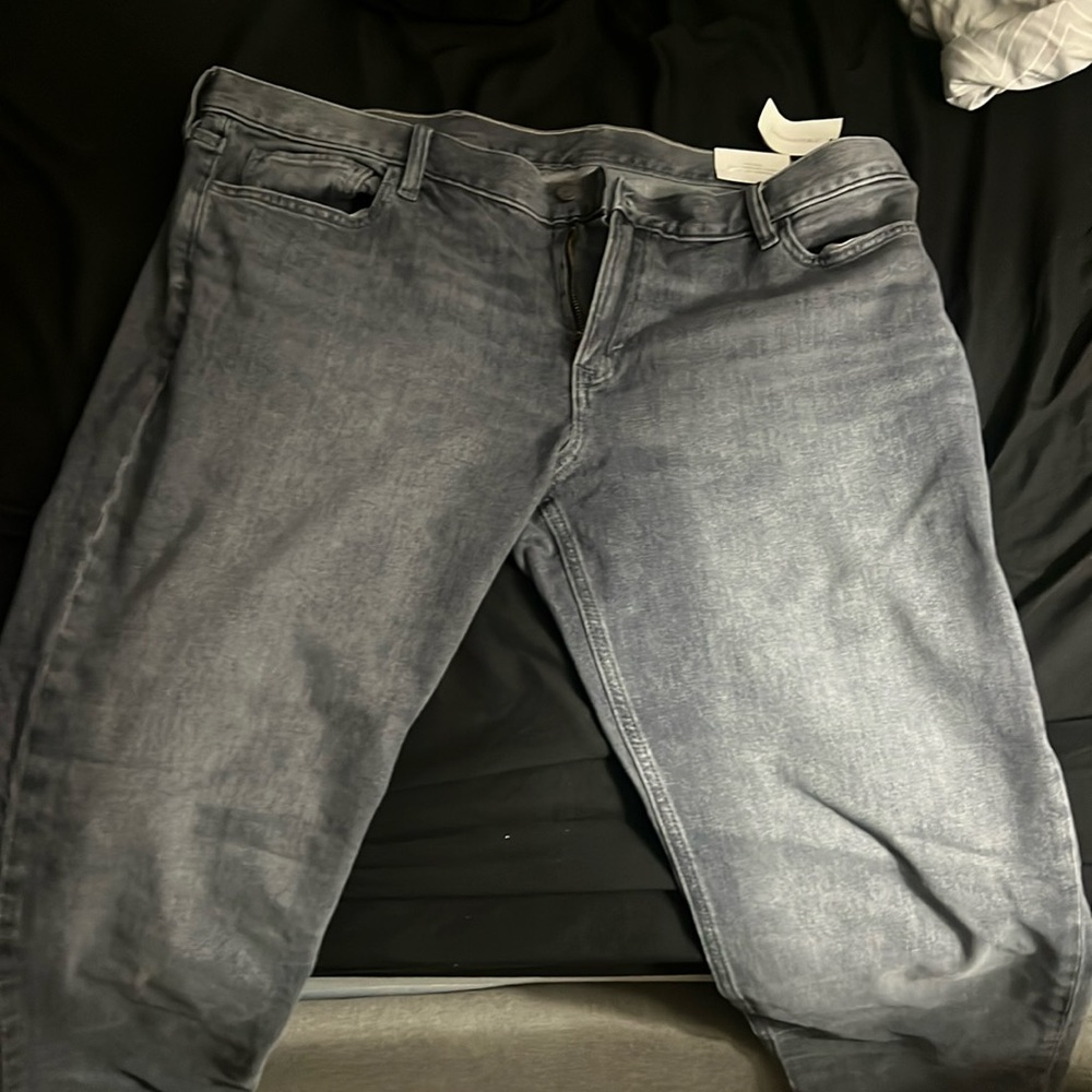 Jeans have never been worn.